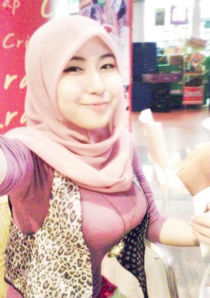 jilbab nyepong kontol