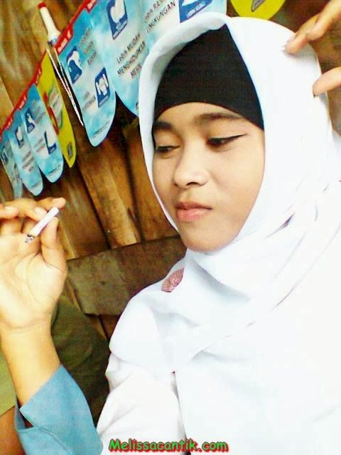 cewek jilbab bugil nyepong