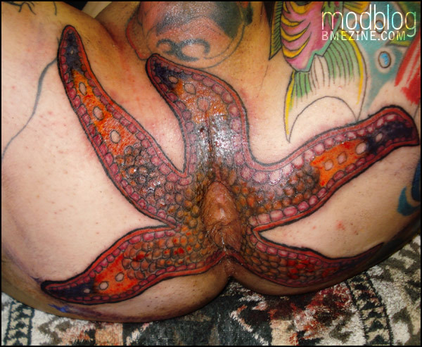 flower spine tattoo