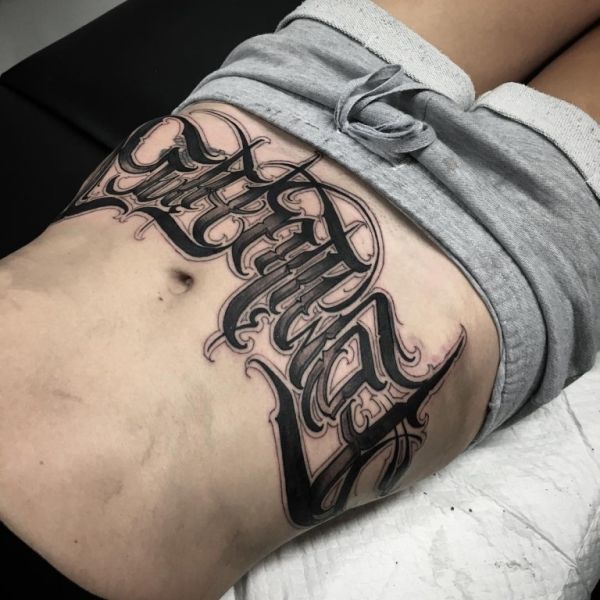 tulisan latin tato